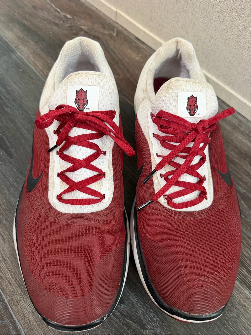 Nike Red and White Low-Top Running Shoes with Black Swoosh